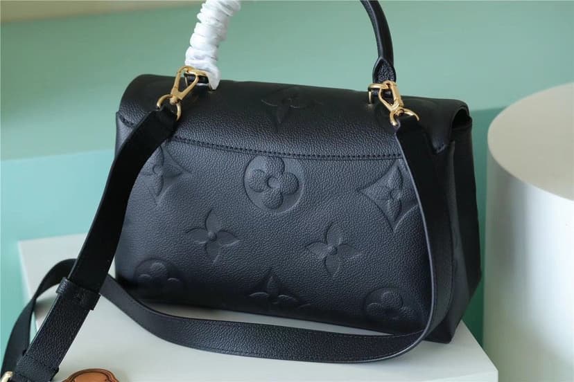 Louis Vuitton Madeleine MM Monogram Empreinte Black For Women, Women's Handbags, Shoulder and Crossbody Bags 11.8in/30cm LV M45976